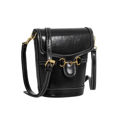 China Vintage Personality Waterproof Saddle Bag Fashionable Bucket Bag Designer Shoulder Bag Pu for sale