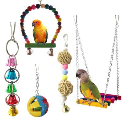 Cina Hot Sale 5pcs Bird Swing Stand Bell Ball Toys Pine Parrots Bite Playing Interactive Toy Sets in vendita