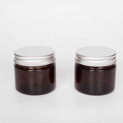 China Empty Glass Candle Jars 100ML 250ML 500ML Home Decorating Skin Care Amber Cream Customer Label With Metal Sliver Lids for sale