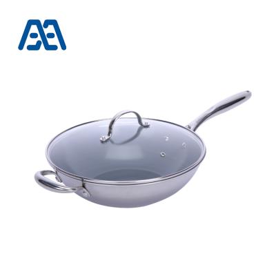 China New Technology Non Stick Tri Ply Stainless Steel Sustainable Wok for sale