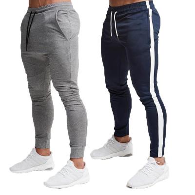 China Custom QUICK DRY Elasticity Men's New Logo Trousers New Pantalones de deportivos de Para de hombre Breathable Jogger Track Pants for sale