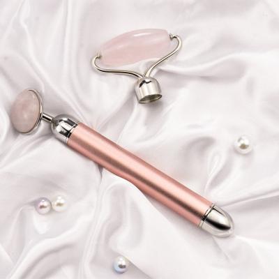 China Automatic Wholesale Luxury Authentic Rose Quartz Jade Roller Massager For Facial Use for sale