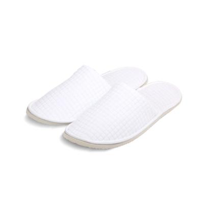 China Casual UG OEM Disposable Hotel Slippers Plane Soft Anti-slip Sole Cotton Luxury Waffle Slipper For Hotel Guestroom for sale