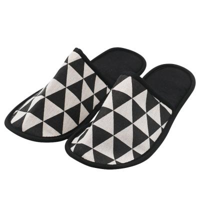 China UG Black Sub Wholesale OEM custom hotel guest room slippers pattern logo Personified black luxury slippers for hotel guest room UG-846 for sale