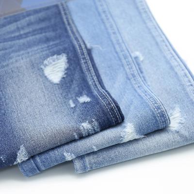 China Breathable Customized Wholesale Blue Bonded Roll Ripped Denim Fabric for sale