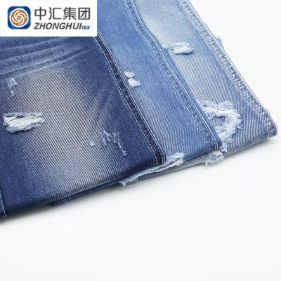 China Breathable Indigo Blue Fabrics Jeans 100 Cotton Denim Fabric For Shorts And Pants for sale