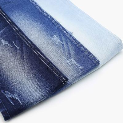 China Breathable Stretch Polyester Spandex Fabric Factory Cheap Denim Fabric For Man Cloth Jeans for sale