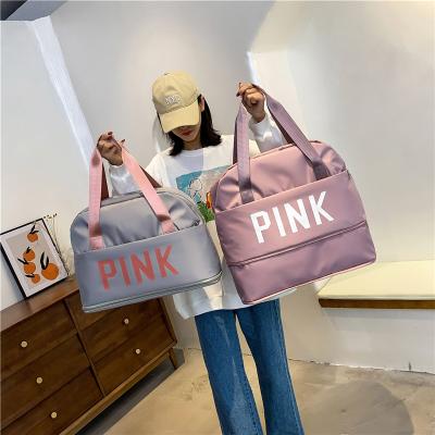 China Fashion Logo Large Capacity Custom Wet Dry Unisex Sports Bags Nylon Outdoor Luggage Bag Travel Handbag for sale