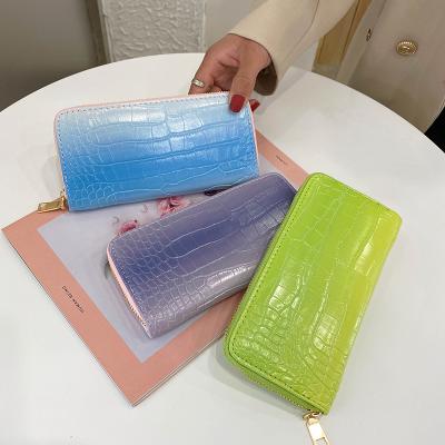 China 2021 Latest Summer Ladies Long Waterproof Wallet Girls Coin Purse Young Lady Cute Short Wallet For Women for sale