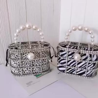 China Wholesale Luxury Metal Cavity Bags Popular Cage Purses Diamond Flannel Handbags For Female for sale