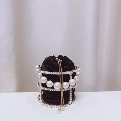 China 2021 luxury wholesale pearl handbag cross - body evening clutches luxury small purses for women for sale