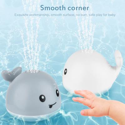 China Kids Play Baby Light Bathtub Toys Whale Water Sprinkler Pool Toys For Toddler Infants Kids for sale