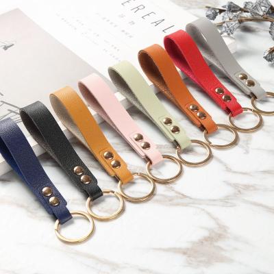 China Creative Cute Female Leather Key Chain Gift PU Leather Manufacturer Bag Pendant Car Key Chain Key Chain for sale