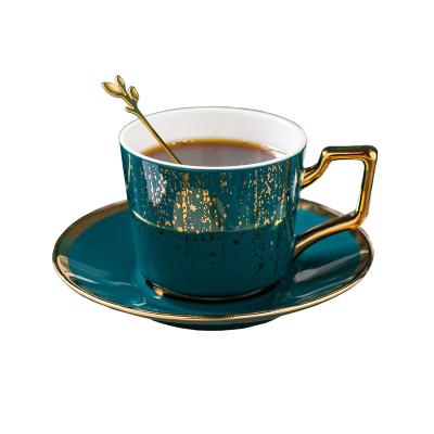 China Hot and popular British style minimalist ceramic cup and saucer with Christmas gold starry design for hot drinking for sale