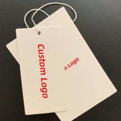 China Cheap Viable Custom Design Printing Logo Paper Garment Hangtag Labels Name Clothing Hang Tags With String for sale