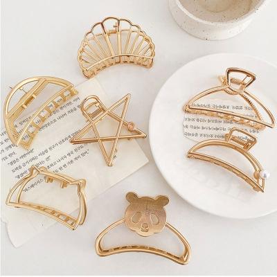 China Japan and Korean Mio Low Moq Newest Style Design Girls Gold Hair Claw Clip Cavity Shark Claw Clip Alloy Large Metal Clamps For Women for sale