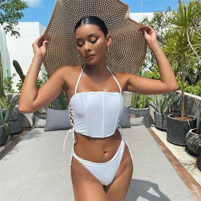 China 2022 Breathable Fashion Halter Neck Black White Side Tie Top And Triangle Bikini Set Women Two Piece Swimsuit for sale