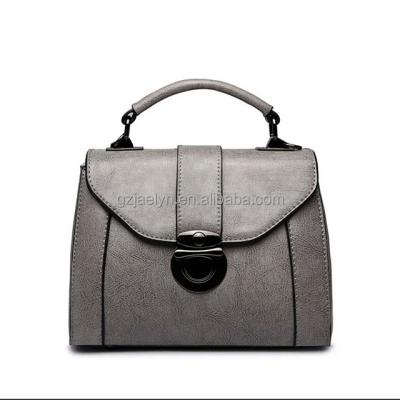 China Luxury TOGGLE BAG women leather top quality genuine leather handbags lady shoulder bags messenger bag for sale