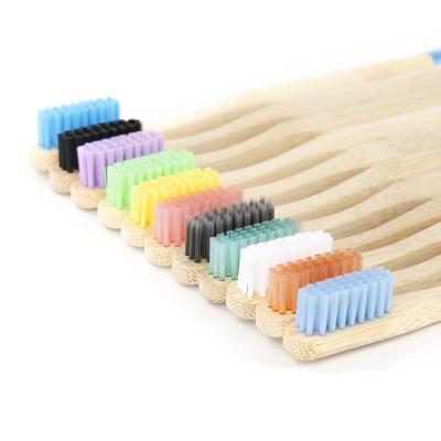 China Disposable Eco Friendly Charcoal Infused Bamboo Toothbrush Nylon Adult Toothbrush for sale