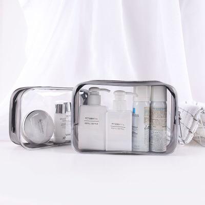 China Custom Clear PVC Waterproof Dustproof Shockproof Logo Bag Travel Cosmetic Plastic Bag With Branded Logo for sale