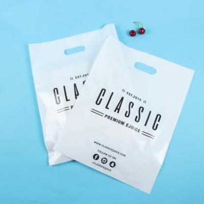 China Custom Logo Die Cut Plastic Handle Bags Recyclable Packaging For Clothing for sale