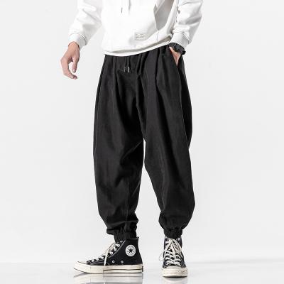 China Anti-pilling Custom Designs Streetwear Wide-Leg Baggy Trouser Pants Mens Plus Size Sweatpants Outdoor Sports Mens Casual Harem Pants for sale