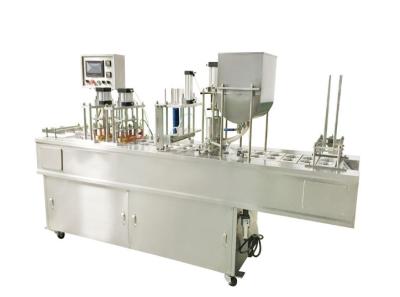 China Semi Pneumatic Piece Film Filling Capping Machine For Packing Pudding / Mineral Water for sale