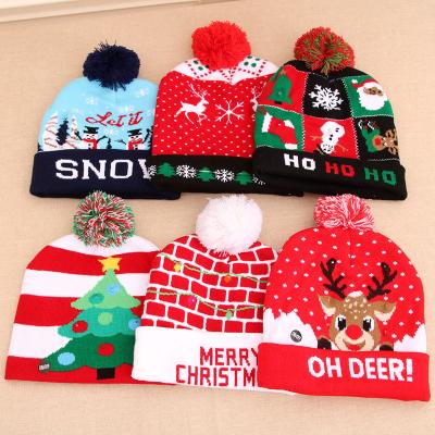 China New Christmas Gift Lighting Knitted Pompom Christmas Beanie LED Christmas Hat With Light Xmas Holiday Party Gift Hat for sale