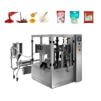 China Food Envasadora Rotativa Stand Up Oil Bag Juce Packaging Machine Viscous Liquid Rotary Pouch Packaging Machine Price for sale