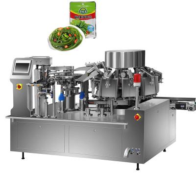 China Automatic Rotary Food Nitrogen Gas Filling Vacuum Sealing Packing Machine for sale