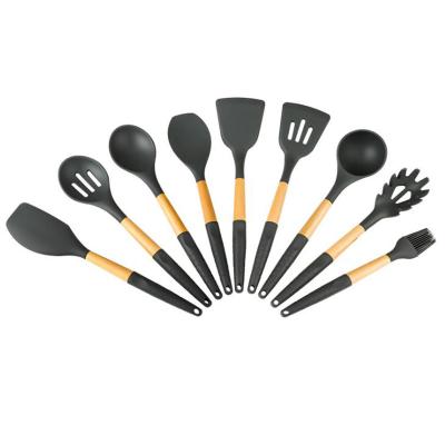 China Sustainable Kitchen Cocina Utensils 9PC Soft Silicone Utensil Set Hot Sale Beech Wood Handle Kitchen Accessories for sale