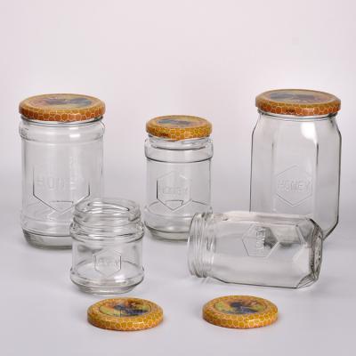 China Storage bottles and jars Supply hexagonal round glass honey bottle, pickles, chili sauce, pickles and other dry goods storage bottles for sale