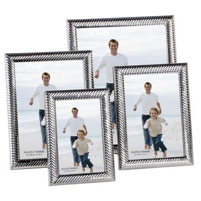 China Metal Roll Shape Picture Frame, Silver Or Gold Plated Iron for sale