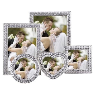 China Modern Glitter Rhinestones Inlaid Zinc Alloy Border Diamante Photo Frames for sale