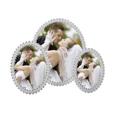 China TOP 5 recyclable materials SOLD IN UK, special for wedding square, rectangle and heart shape pearl and crystal for wedding photo frame for sale