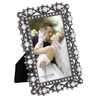 China Elegant home decoration .office picture photo frame alloy photo frames pearl picture frames for sale