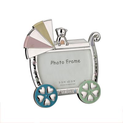 China Lovely creative carriage child photo frame enamel decorated baby photo frame gift frame for sale