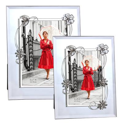 China Table Stand Fashion Frame Metal Border Adhered Glass Mirror Photo Frame for sale