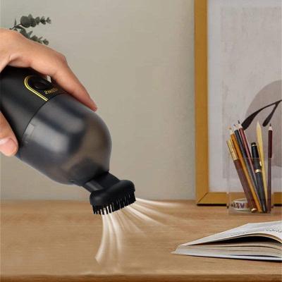 China YIZHI Hotel Mini Cordless Rechargeable Portable Desk Vacuum Cleaner Handheld Desk Keyboard Dust Remover For Cars Office for sale