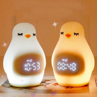 China Creative Student Kids Sleep Trainer YIZHI Cartoon Penguin Table Alarm Clock Children Bedroom Silicone Electronic Decorative Night Light for sale