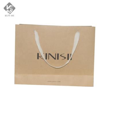 China Recyclable Custom Black White Brown Kraft Paper Tote Bag Ribbon Handle Shopping Carry Paper Bag For Apparel for sale