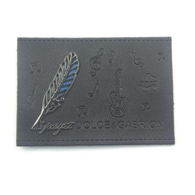 China Viable Hot Sale Wings Black Jean Leather Label Metal for sale