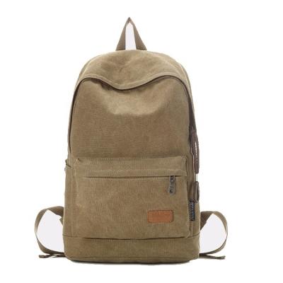 China Anti-theft fashion canvas school bag simple waterproof custom backpack for boys and girls for sale