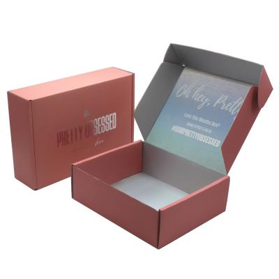 China Handmade custom logo printing corrugated curragated cosmetic box pink RP packaging box for sale