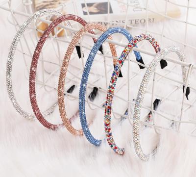 China 2021 Lady's Fashional simple thin band pretty new and flexible shinny non-slip rhinestone diamond headband hair accessories for sale