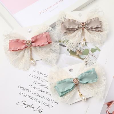 China Environmental friendly hot sale sweetwoo girl hair accessories soft leaves printed large butterfly alligator hair clips bow for sale