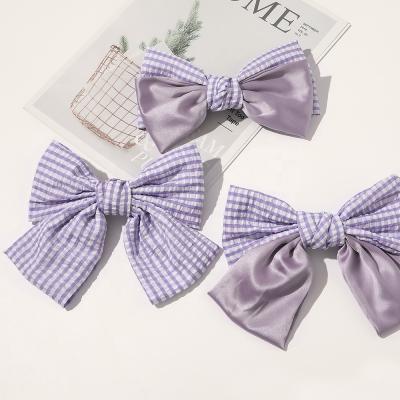 China New fashion 3 kinds of environmentally friendly sweetwoo grade large hair bow butterfly hair accessories plaid alligator hair clips for sale