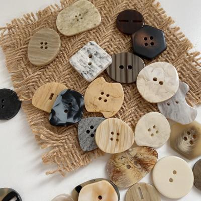 China Viable Clothing Accessories Factory Wholesale New Fancy 2/4-holes Buttons Decorative Button 4 Holes Button Viable Box Custom Round for sale