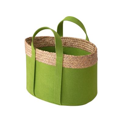 China Resin Felt Sustainable Customized Weaving Basket Grass Box Rattan Diaper Cloth Food Handbag Picnic Box With Handle Storage Basket for sale