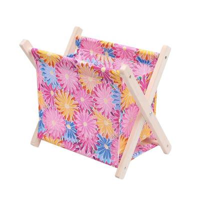 China Wholesale Wooden Foldable Storage Box Fabric Customized Viable Cartoon Magazine Rack Desktop Storage Baskets for sale